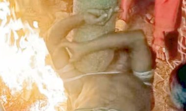 চুরির অপবাদে গাছে বেঁধে যুবকের গায়ে আগুন